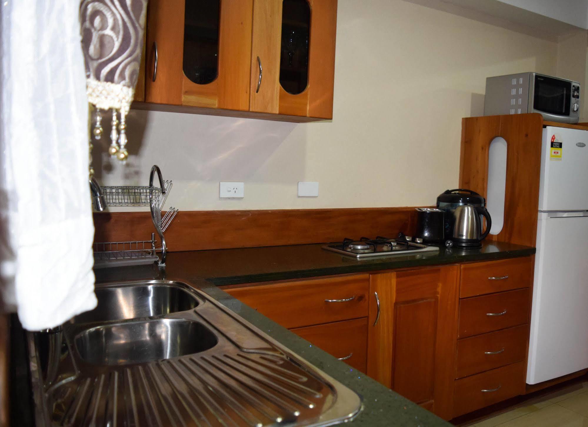 Al - Minhaj Service Apartments Nadi Bagian luar foto